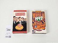 Front view of both VHS tapes with slipcases visible