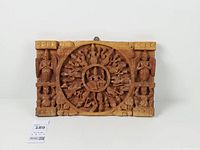 Front view showing full carved panel and scale reference