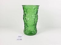 Full view of green crinkle glass vase standing upright