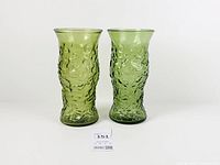 Front view of both emerald green crinkle glass vases standing side by side