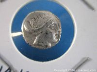 Obverse of silver coin showing head of nymph Histiaia