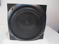 front view of powered subwoofer with grille