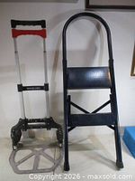 Hand truck and ladder side by side showing full view
