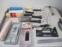 Overall view showing all painting tools and accessories on tabletop