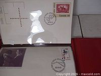 close-up of individual Canadian first day covers with stamps and postmarks