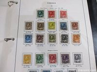 Album page showing King George V Admiral series stamps