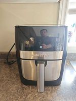 Front view of air fryer on countertop