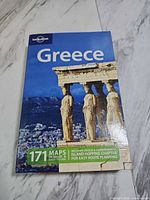 Front cover showing Lonely Planet Greece guidebook