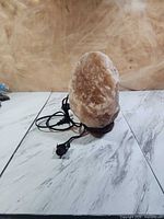 Full view of salt lamp showing overall shape and cord