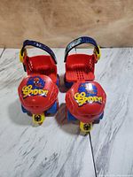 Top view of both skates showing Spider-Man graphics and strap design