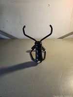 front view of black slingshot frame without band