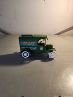 Left side view showing Canada Dry graphics and overall condition