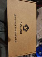 Outer carton labelled “Door Sensor 4 Pack with Hub”