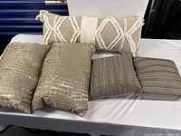 Group shot of all five pillows showing styles and sizes