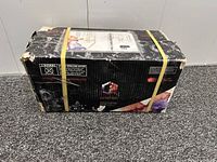 Full view of worn but strapped Prime 6 charcoal box