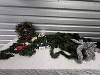 Overall lot showing wreath, garlands, ornaments