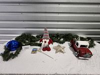 Overall lot view with garlands, gnome, truck, star, blue ornament, bells pack and pick