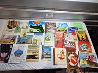Full layout of 23 Russian children’s books on table