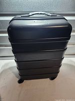 Full front view of Skyline hard-shell suitcase