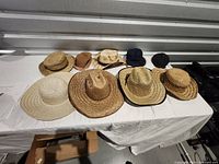 Group shot of all hats laid out on table