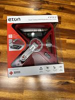 Front of sealed box showing Eton FRX3 weather alert radio