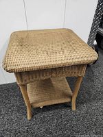 Overall view of square wicker side table front and top
