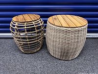 Two wicker stools side by side showing overall design, wood tops visible