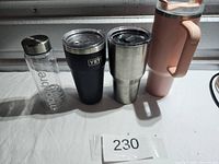 Front view of all four drinkware items on table