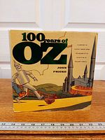 Front view of book with dust jacket showing title and artwork