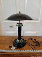 Full view of lamp showing shade, column, base and cord