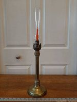 Entire candlestick with chimney and candle