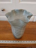 Full height view displaying spiral swirl pattern and ruler for scale