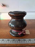 Perspective view of entire candle holder showing shape and finish