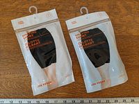 Front view of two sealed Joe Fresh Shaping Short packages