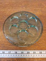 Top view showing seven recesses and green tint