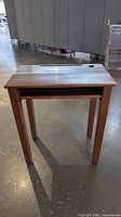 Front view of antique red oak desk showing full structure