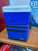 Coleman hard cooler stacked on Arctic Zone soft cooler front view