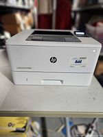 Front view of HP LaserJet Pro M402n printer