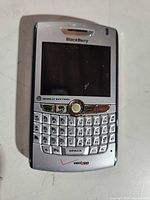 Front view of BlackBerry 8830 World Edition with screen, keyboard and trackball visible