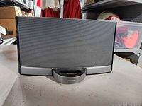 Front view showing grille and dock