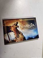 Front cover of postcard book showing title and artwork