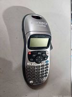Front view of Dymo LetraTag label maker showing screen, keypad and exterior condition