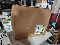 Sealed Halyard shipping carton side view