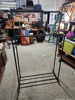 Full view of black metal garment rack