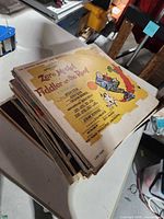 Stack of records topped by Fiddler on the Roof sleeve