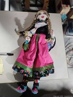 Full view of 2.5ft cloth doll showing entire outfit and attached baby doll