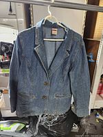 Front view of Faded Glory stretch denim jacket on hanger