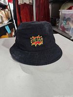 Front view showing Surge embroidered logo and overall hat condition