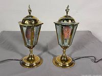 Pair of brass lantern-style table lamps unlit