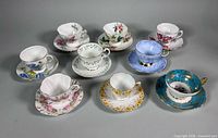 Group shot of all nine teacup and saucer sets